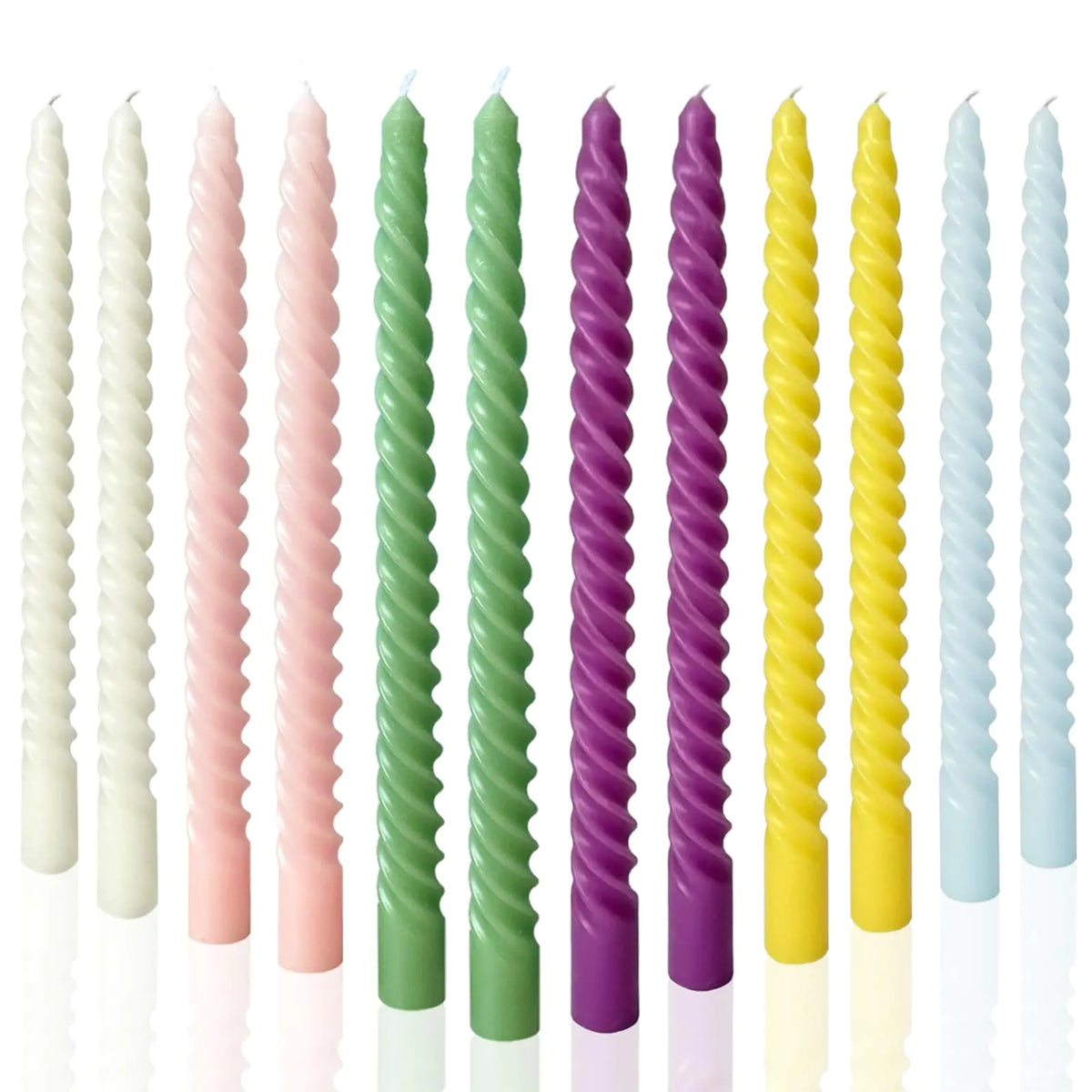 Taper candles lit on a table