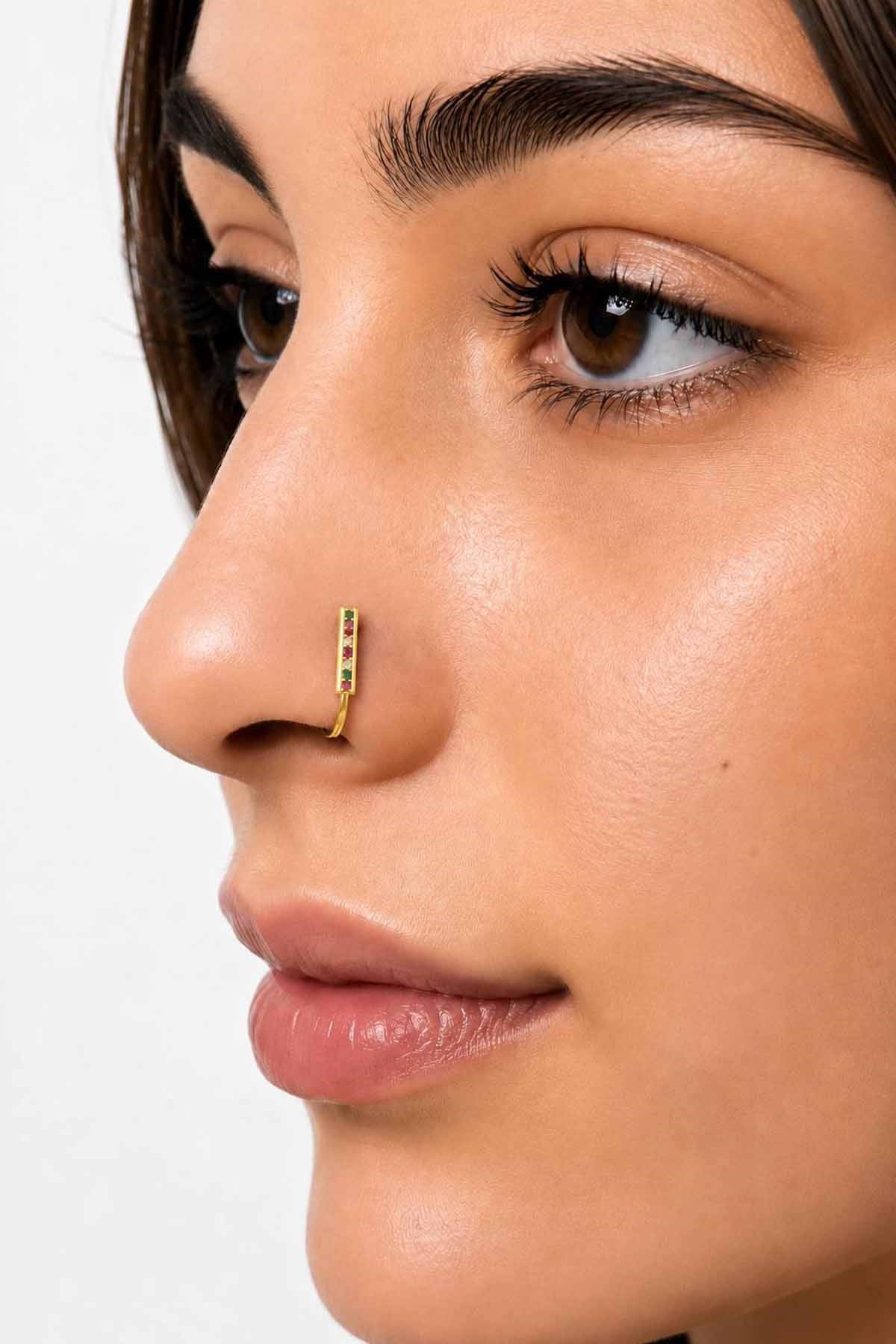 Gold-tone clip-on nose ring with stone detail