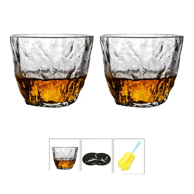 Whiskey glass held in hand