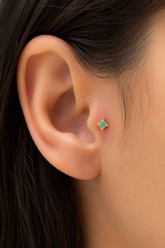 Gold-tone blue stone tragus stud