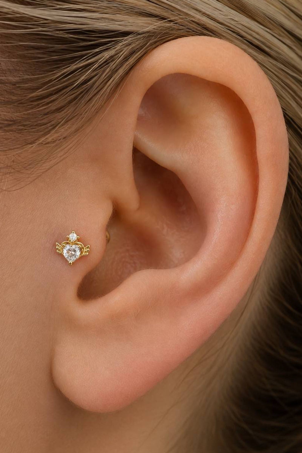 Gold-tone heart tragus stud