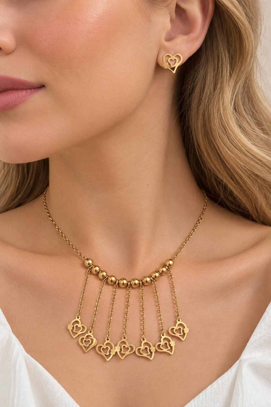 Gold-tone heart necklace and earring set with ball detail