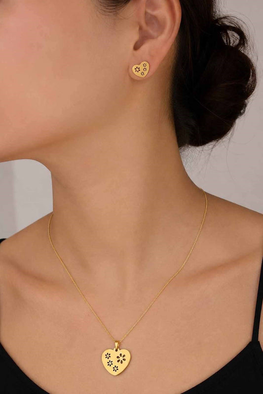 Gold-tone heart necklace and earring set with flower detail