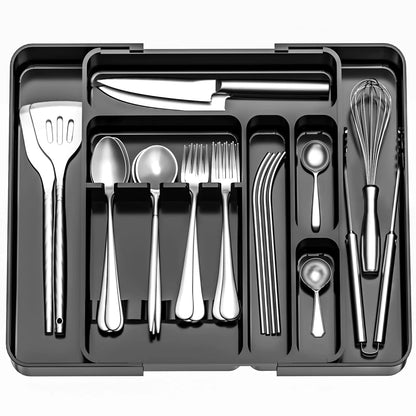 Bamboo drawer organiser holding cutlery