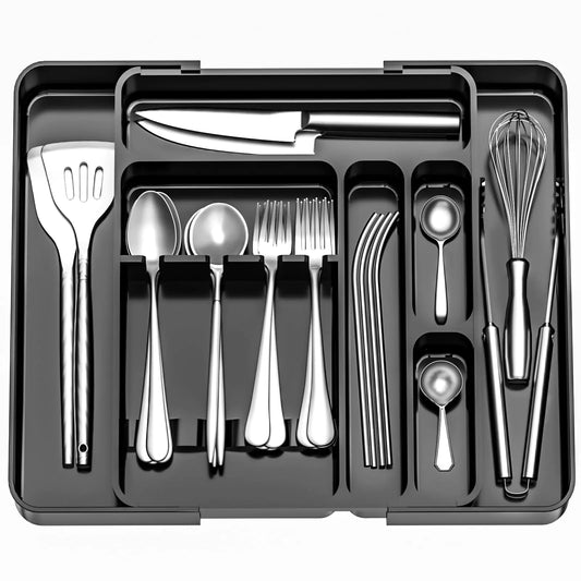 Bamboo drawer organiser holding cutlery
